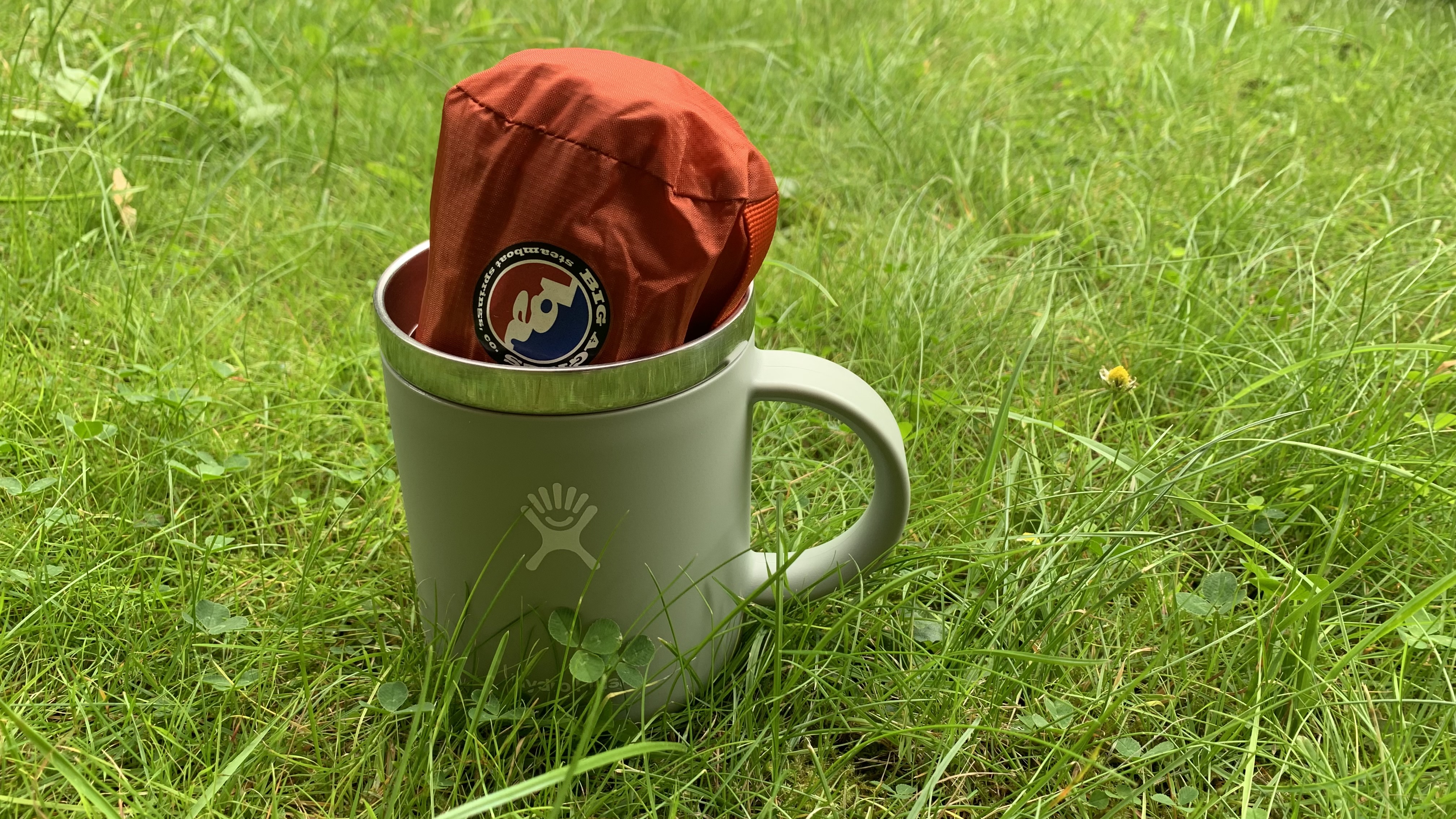 Big Agnes Rapide SL pillow packed away in a camping mug