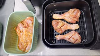 Chicken drumsticks in the large drawer of the Philips 5000 Series Dual Basket Air Fryer XXL Steam