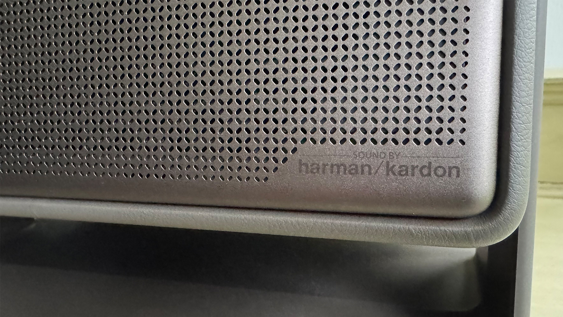 Xgimi Horizon 20 Max home cinema projector close up on grilled and Harman Kardon logo