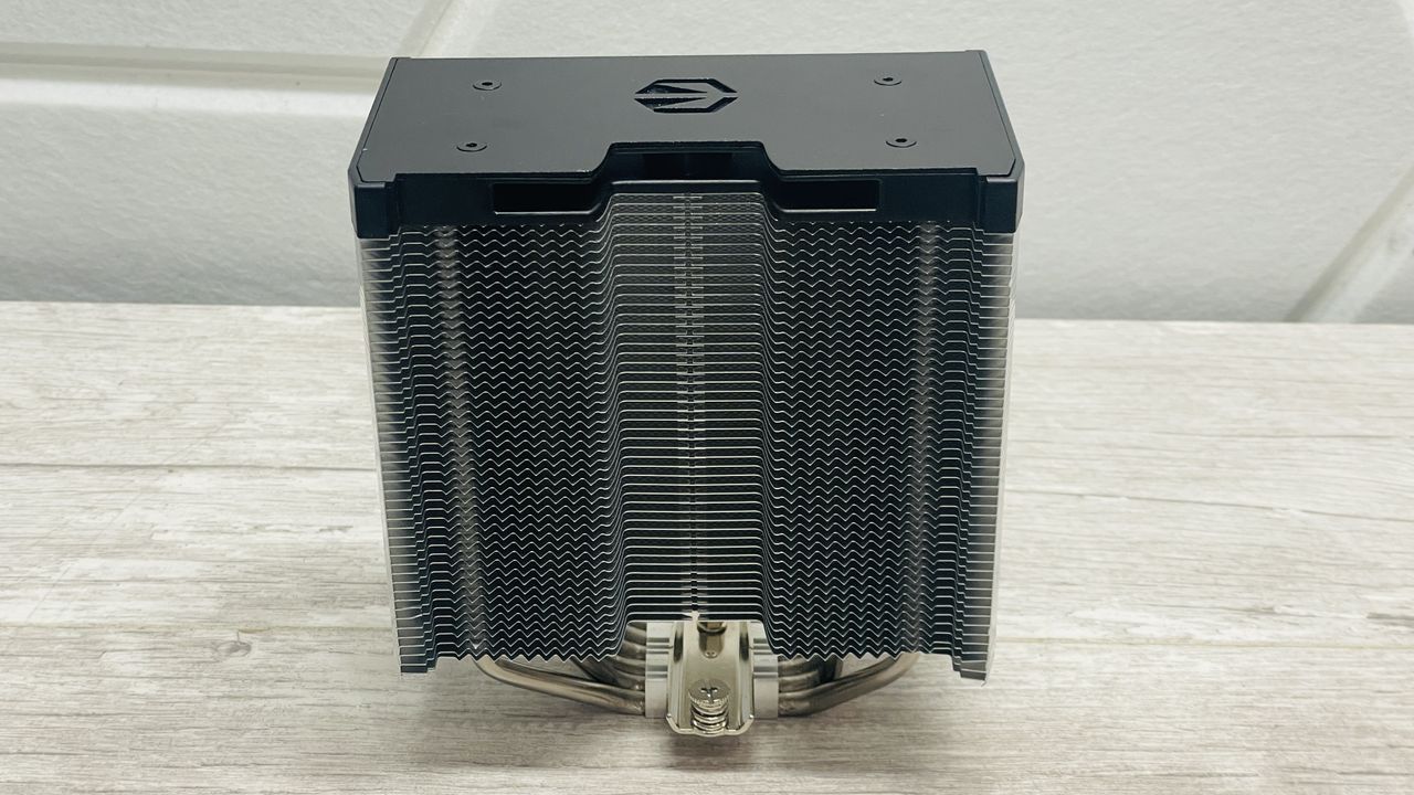 Endorfy Fortis 5 air cooler on a desk and loaded onto a motherboard.