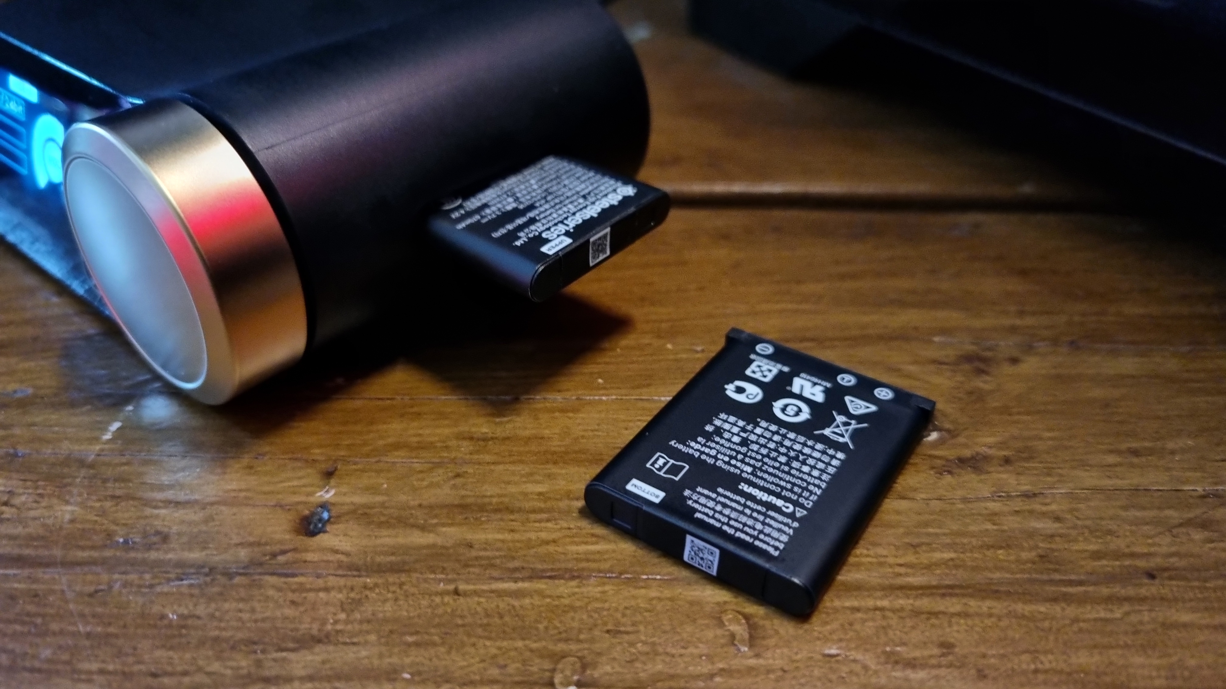 The Arctis Nova Elite Game Hub in Sage Gold, with swappable battery charging