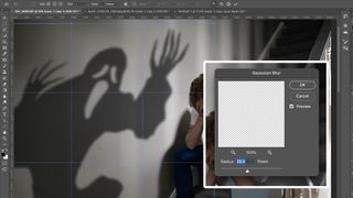 Adobe CC screenshot of shadowy specter and Gaussian Blur window