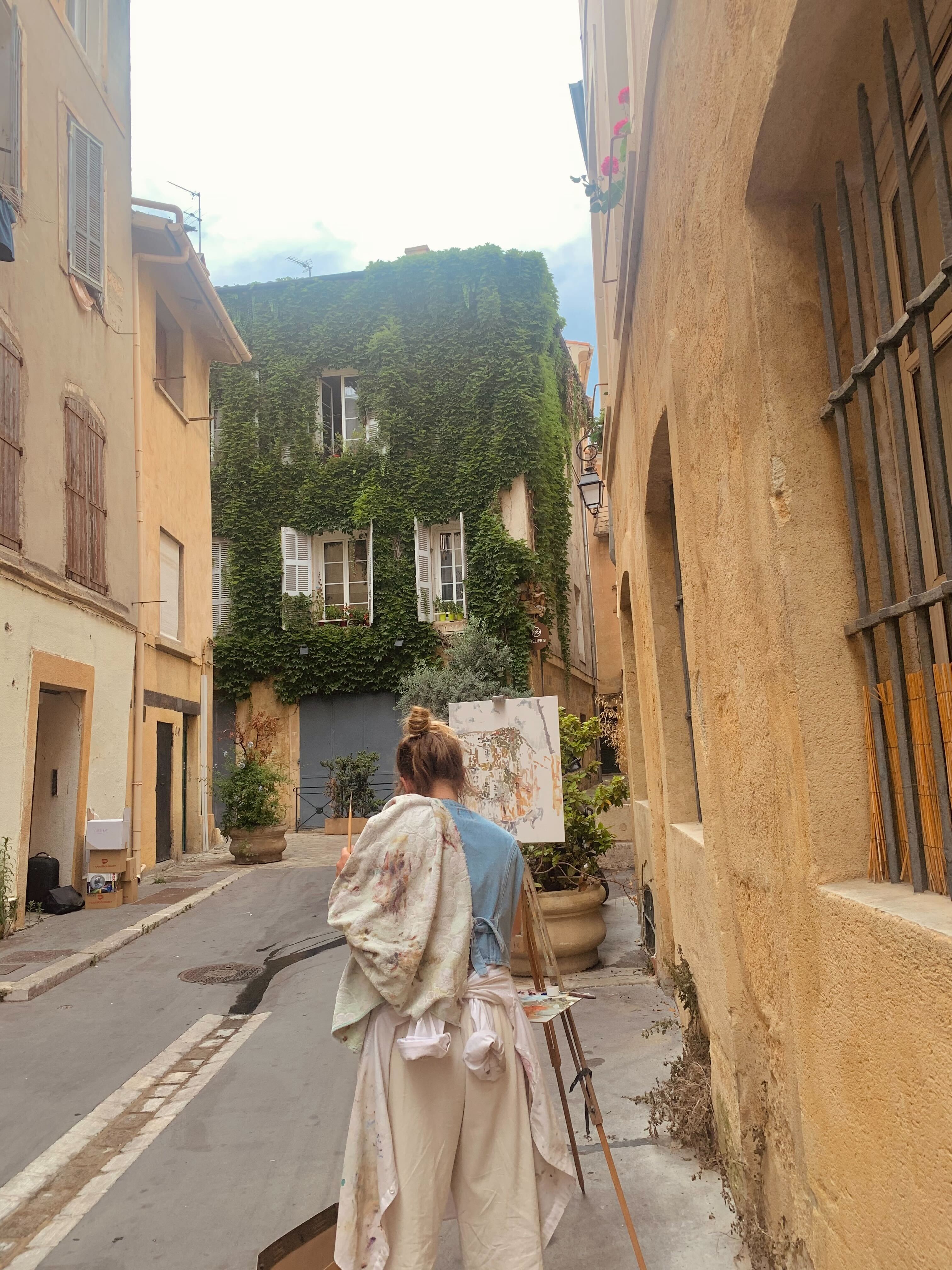 A series of images depicting the architectural, design, and nature standouts of Aix-en-Provence features picturesque alleys wrapped in vegetation, modernist interiors, and snapshots of food.