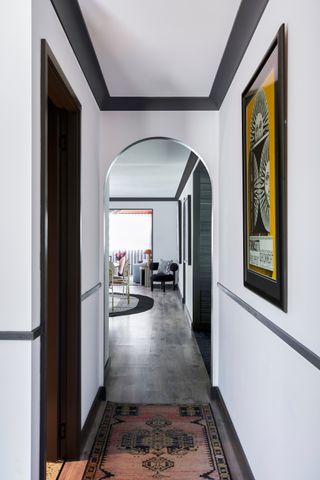 a grey archway between rooms