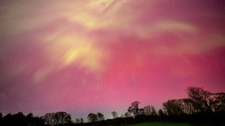 red sky created by northern lights