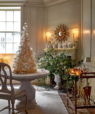 Festive room decorated in white and gold