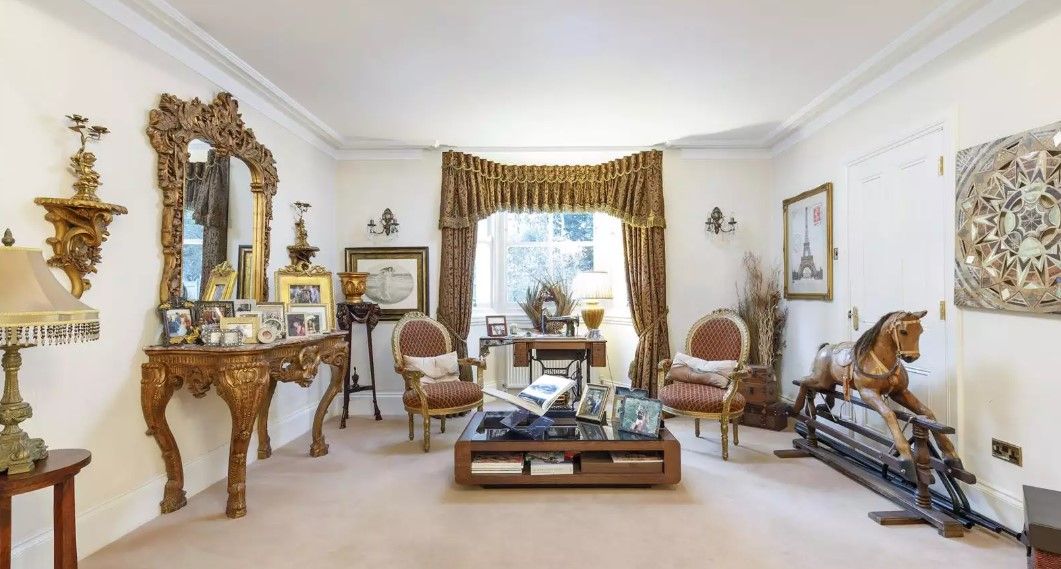 The home office includes many Victorian pieces such as mirrors and a rocking horse