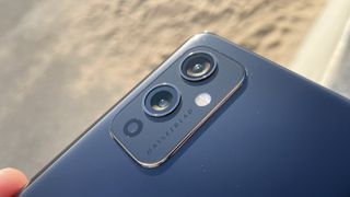 A close-up of the camera on a OnePlus 9