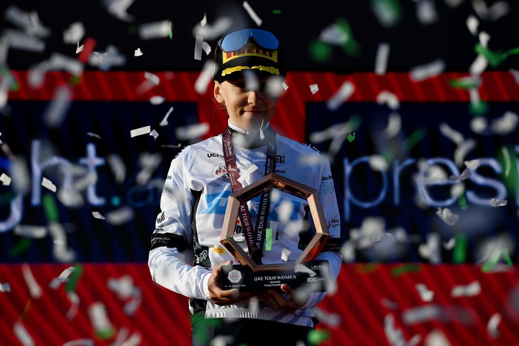 ABU DHABI UNITED ARAB EMIRATES FEBRUARY 12 Gaia Realini of Italy and Team Trek Segafredo celebrates at podium as White best young jersey winner during the 1st UAE Tour Women 2023 Stage 4 a 119km stage from Fatima Bint Mubarak Ladies Sports Academy to Abu Dhabi Breakwater UAETourWomen UCIWWT on February 12 2023 in Abu Dhabi United Arab Emirates Photo by Tim de WaeleGetty Images