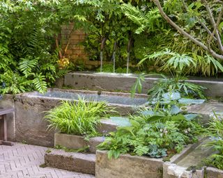 The Ecotherapy garden with hypertufa at Chelsea Flower Show 2024