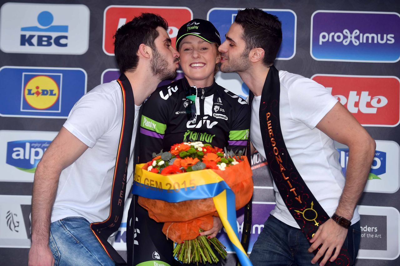 The controversial podium boys each have a kiss for the race winner