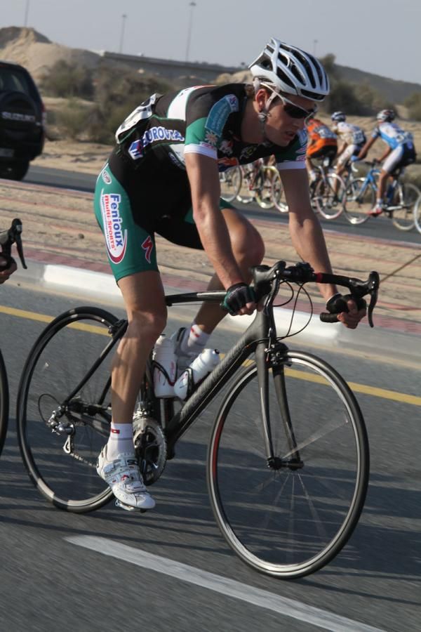 The break pass the peloton on the opposite side of the highway