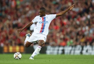 Cheick Doucoure of Crystal Palace shoots at goal during the Premier League match between Liverpool FC and Crystal Palace at Anfield on August 15, 2022 in Liverpool, England.