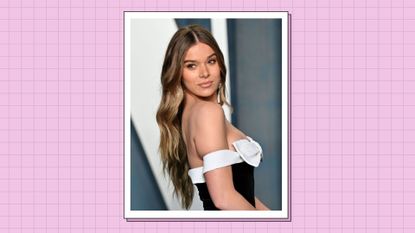 Hailee Steinfeld wears a white and black dress as she attends the 2022 Vanity Fair Oscar Party hosted by Radhika Jones at Wallis Annenberg Center for the Performing Arts on March 27, 2022 in Beverly Hills, California./ in a purple template