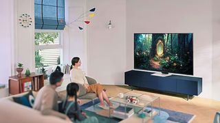 Samsung QN85C hero image of a family gathered around the TV watching in a living room
