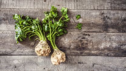 Celeriac on a wooden background