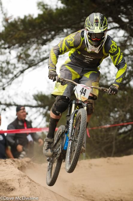 Conrad Culleney flying off a berm mid-course