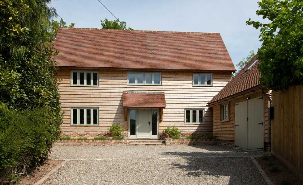 Self build house with gravel driveway