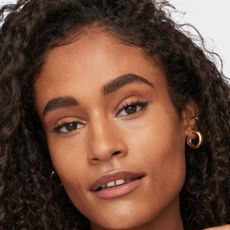 maybelline model with beautiful eye makeup and glowing skin 
