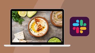 A laptop showing a photograph of some delicious hummus next to the Slack logo.
