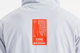 The back of OROS' 39A flight jacket displays a quote from Neil Armstrong that embodies the mantra, "Find your beyond."