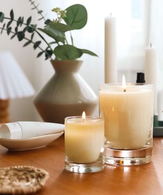 A set of Kai candles in Naadine Koi's home with eucalyptus foliage