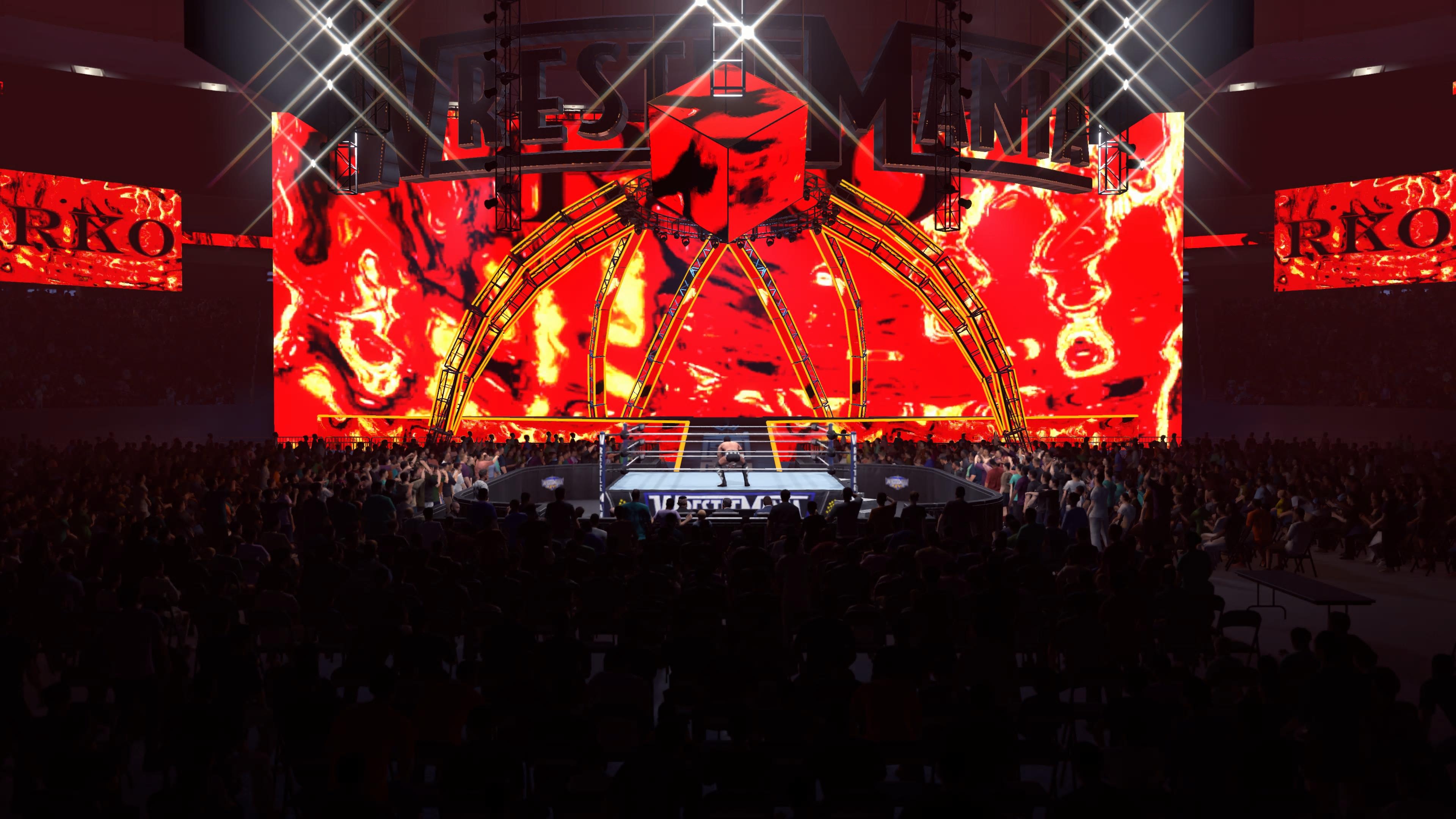 لقطات شاشة داخل اللعبة من لعبة المصارعة WWE 2K26، تظهر المصارعين في الحلبة، وهم يقومون بالدخول، والساحة