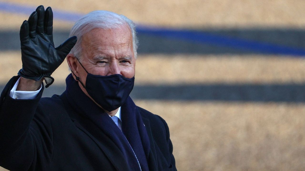 U.S. President Joe Biden walks the abbreviated parade route after Biden&#039;s inauguration on January 20, 2021 in Washington, DC. Biden became the 46th president of the United States earlier today during the ceremony at the U.S. Capitol.