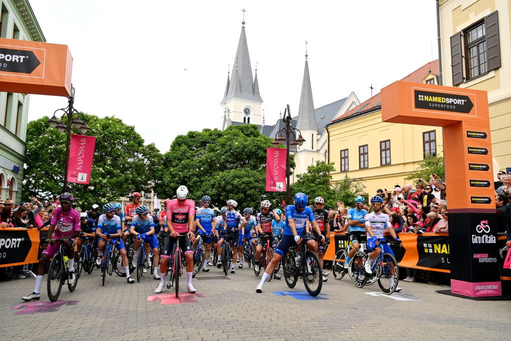 BALATONFURED HUNGARY MAY 08 LR Hailu Biniam Girmay of Eritrea and Team Intermarch Wanty Gobert Matriaux purple points jersey Mathieu Van Der Poel of Netherlands and Team Alpecin Fenix pink leader jersey Rick Zabel of Germany and Team Israel Premier Tech blue mountain jersey and Matteo Sobrero of Italy and Team BikeExchange Jayco white best young jersey prior to the 105th Giro dItalia 2022 Stage 3 a 201km stage from Kaposvr to Balatonfred Giro WorldTour on May 08 2022 in Balatonfured Hungary Photo by Stuart FranklinGetty Images