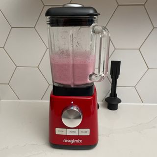 Blended frozen berries, banana and chia seeds smoothie in Magmix Power Blender