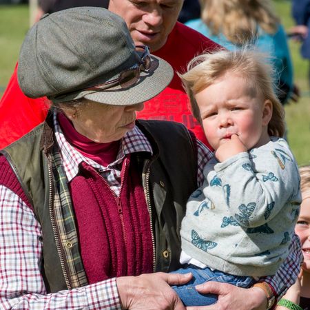 Princess Anne holding Mia Tindall
