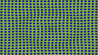 Blue ovals on a green background appear to move, flowing slowly like magma
