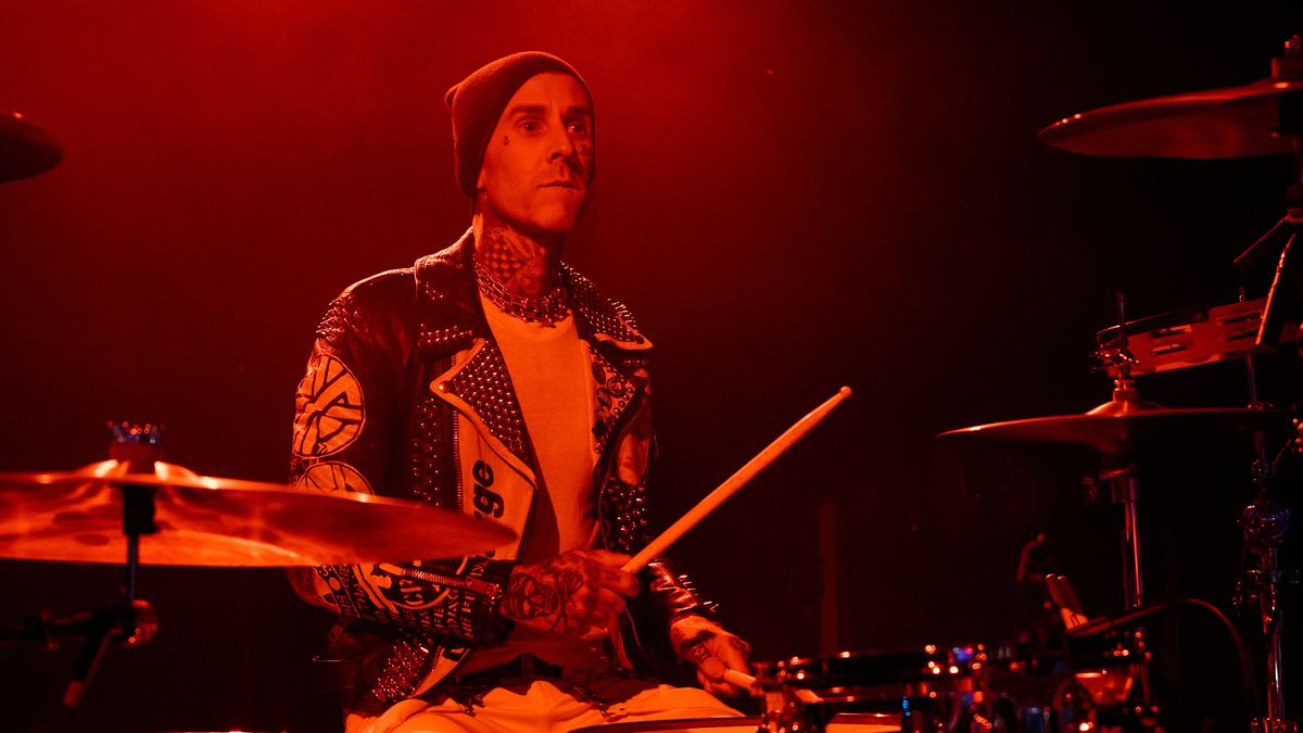 Travis Barker playing drums