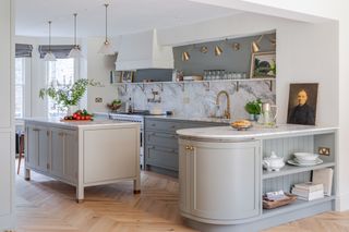Gray kitchen with curved island