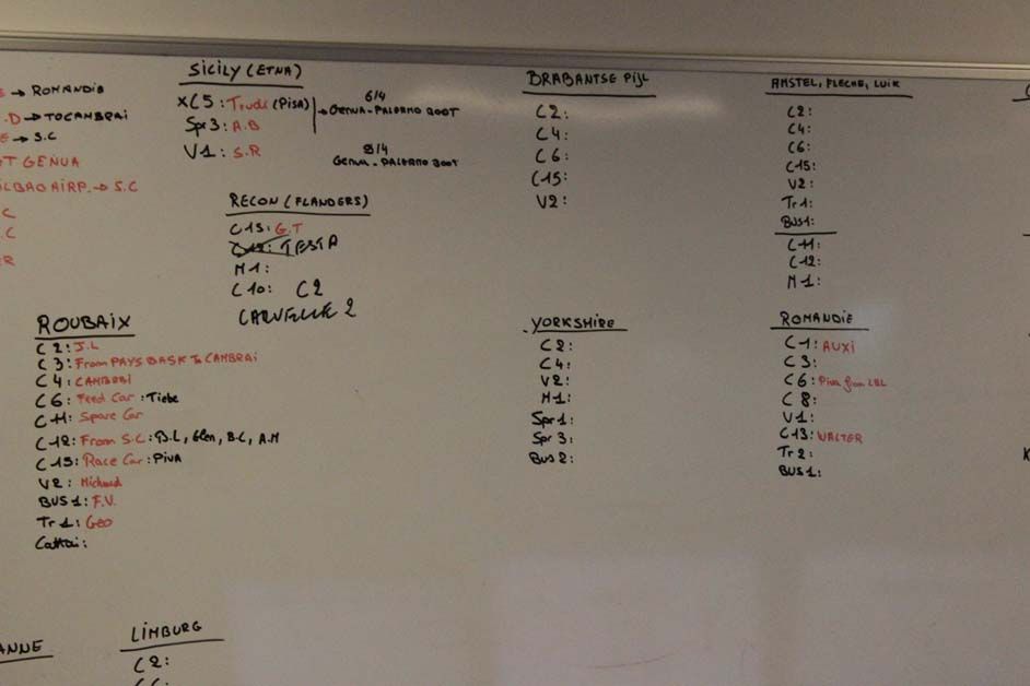 A white board in Noel Dejonckheere's office plans where all the team's vehicles need to be
