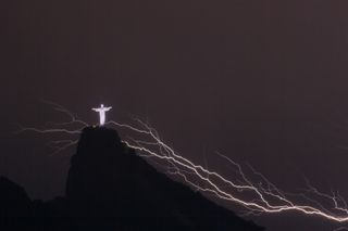 Brazil-Lightning-Christ the Redeemer by Yasuyoshi Chiba AFP Photo via Getty Images