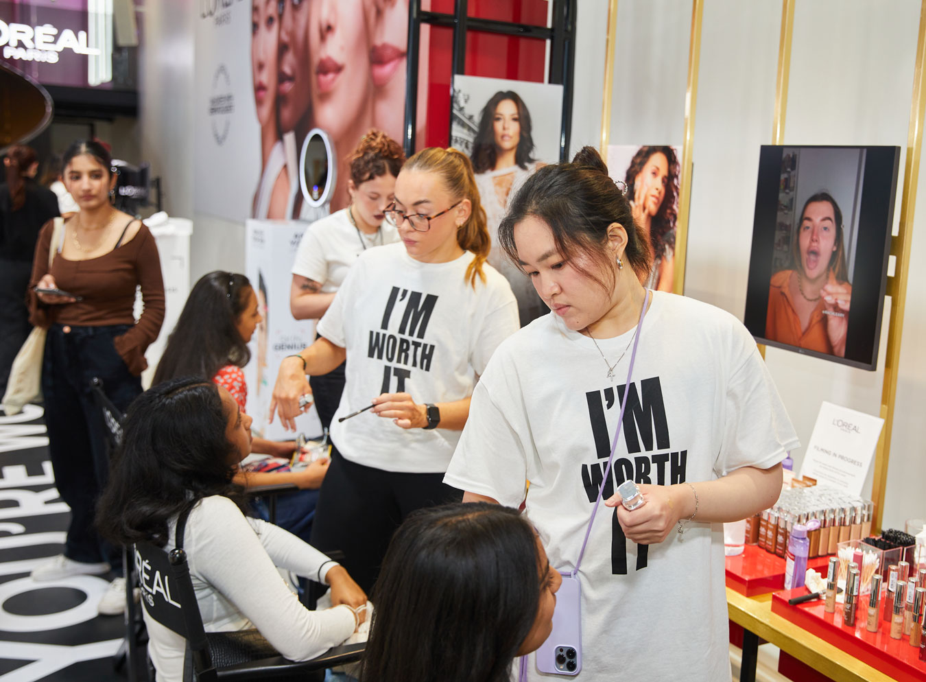 experiential design - people having their make up done