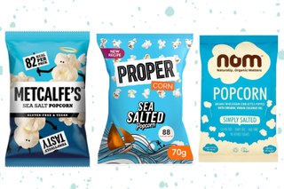 Cut outs of Metcalfe's, Propercorn and Nom popcorn on a blue speckled backgrouns