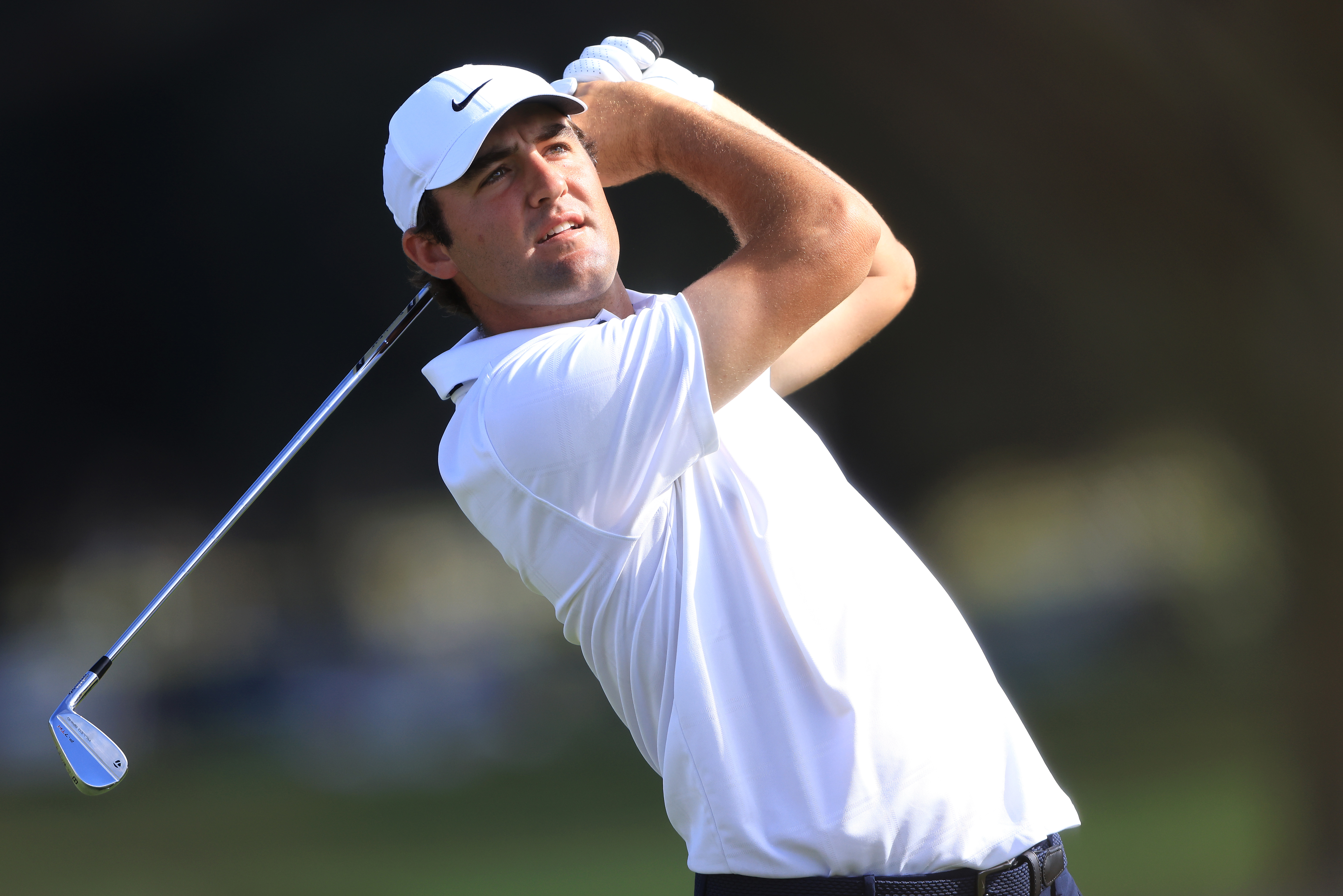 Scottie Scheffler hits an iron shot