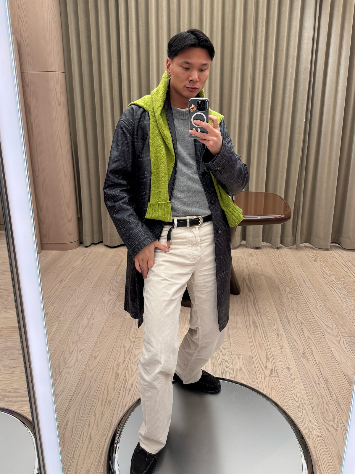 Who What Wear editor in residence Joseph Tang wearing a leather coat.