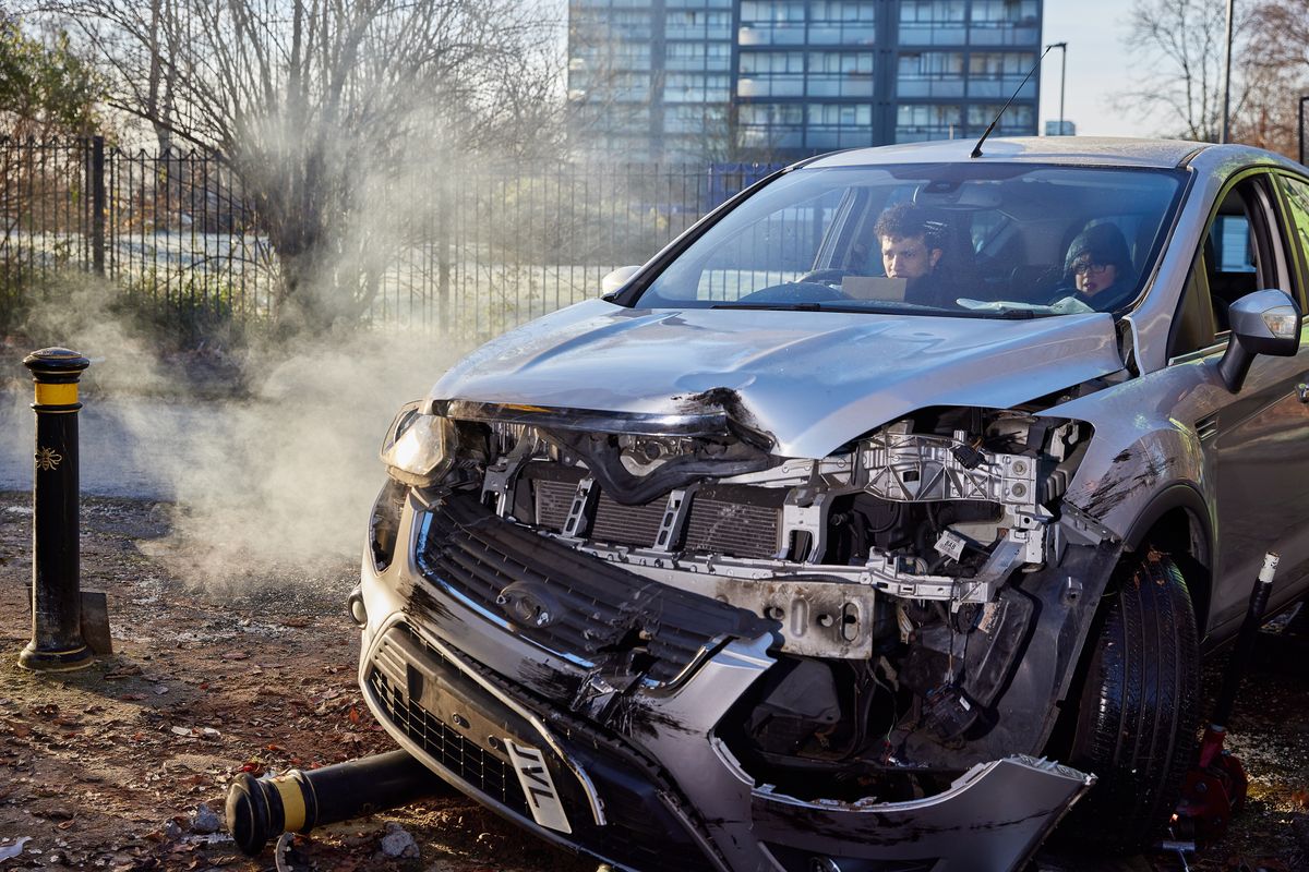 Simon Barlow crashes a car with Sam Blakeman in the passenger seat.