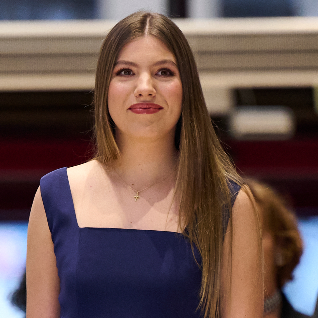 Infanta Sofia wearing a blue dress and smiling
