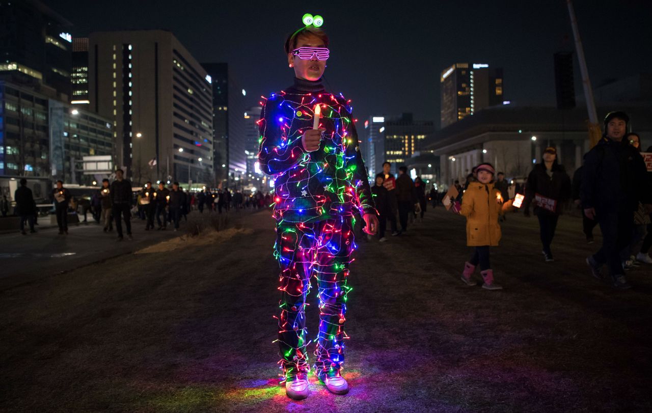 An anti-government protester takes part in a rally in Seoul demanding the arrest of President Park Geun-hye