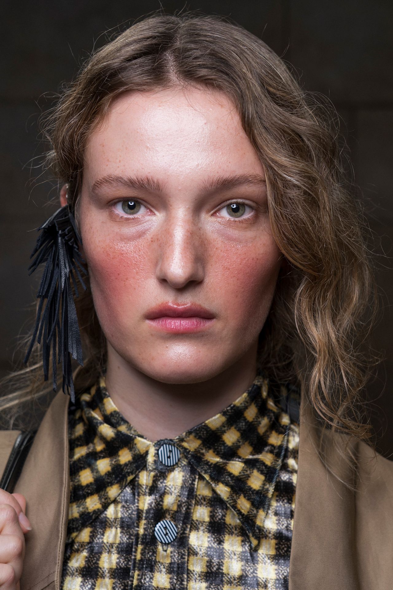 Various women with pops of color on their cheeks