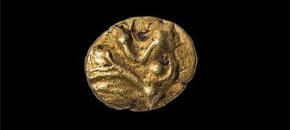 Diver accidentally discovers world's oldest gold coin