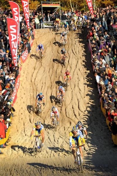 The Elite men descend in the sand.