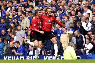 David Beckham celebrates with Roy Keane after scoring against Everton in his last match for Manchester United in 2003.