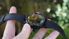 Samsung Galaxy Watch 6 Classic being held up