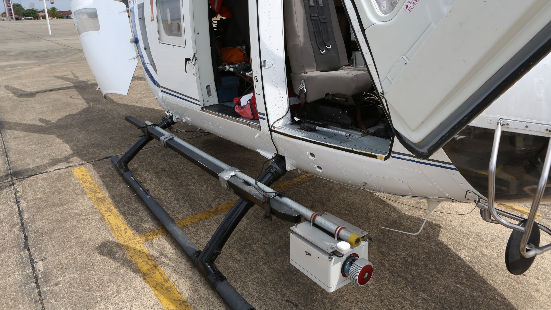 The Riegl VUX-1 scanner with a Trimble APX-15 UAV GNSS, attached to the Eurocopter AS350 helicopter.