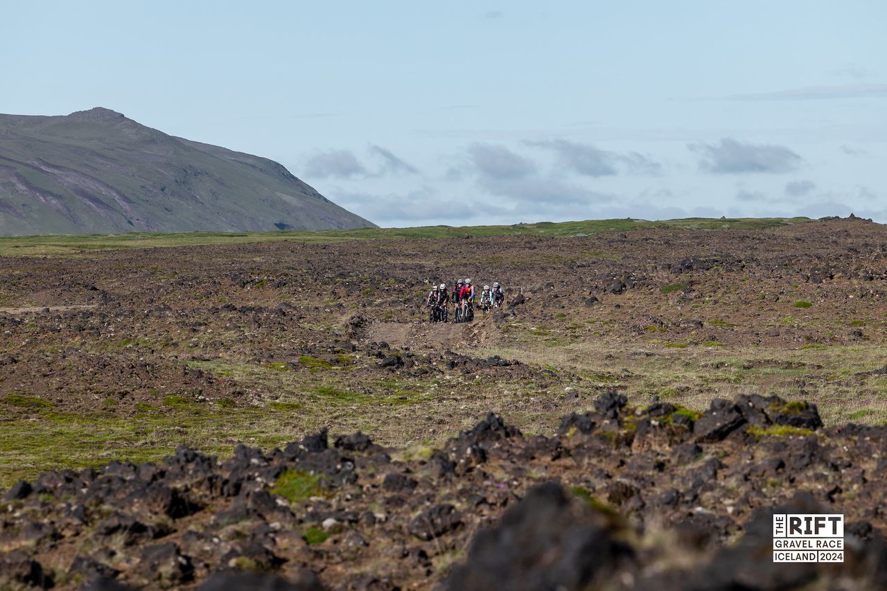 Riders crossing the expansive lava fields of Iceland